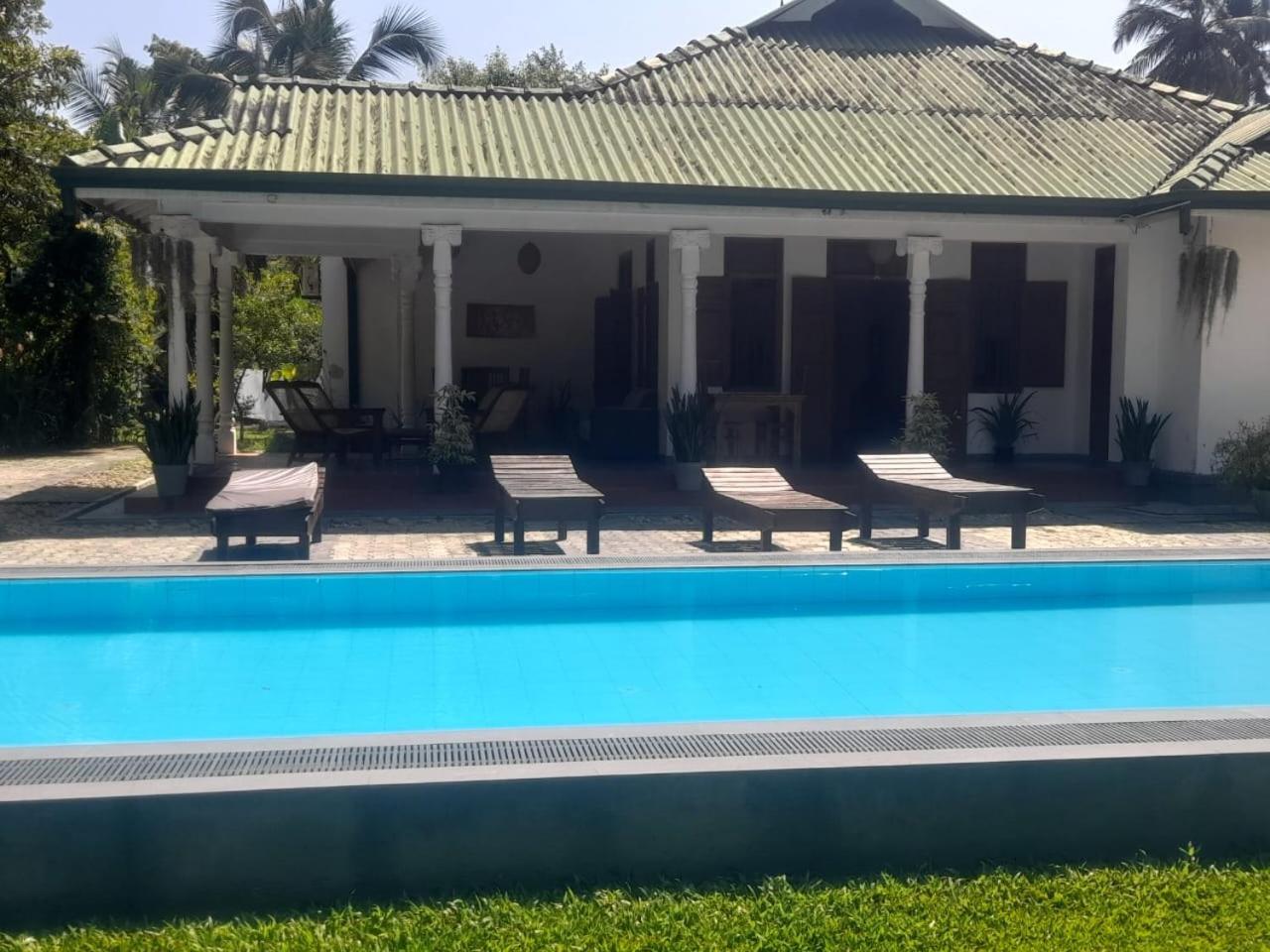 Tranquility Guest House Хиккадува Экстерьер фото