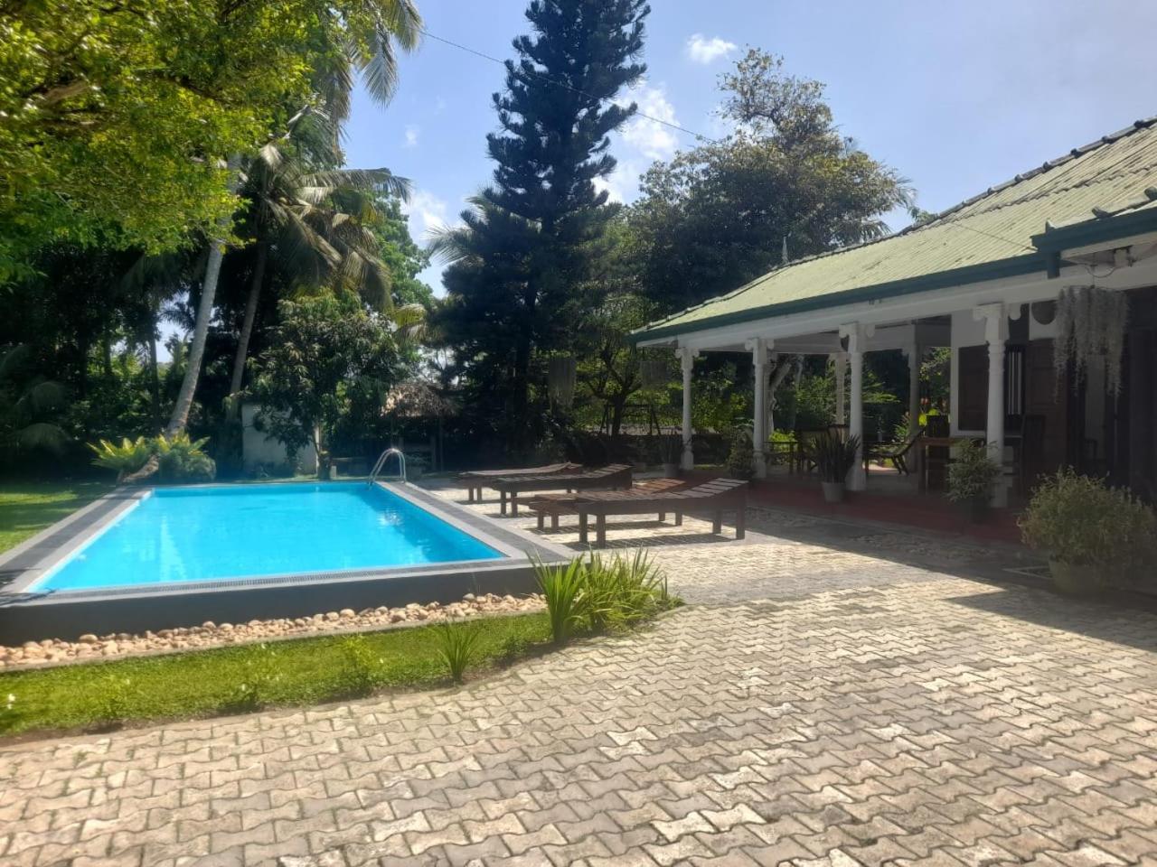 Tranquility Guest House Хиккадува Экстерьер фото